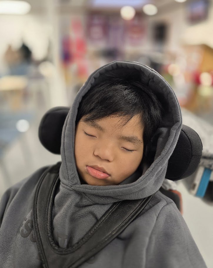 Arel in his grey hoodie